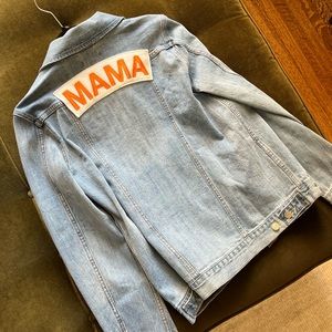 Light denim jean jacket new with tags ! Mama patch on back. New size medium